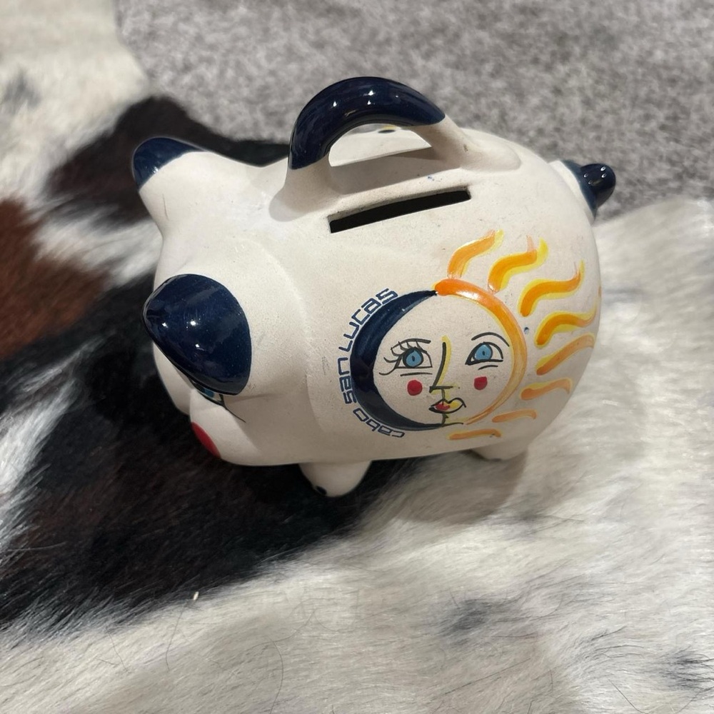 White and Blue Piggy Bank with Sun and Moon Design